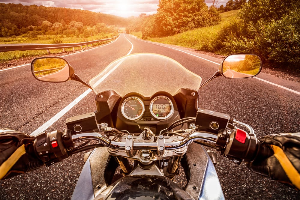 Motorcyclists-view-of-riding-a-motorcycle-on-empty-road